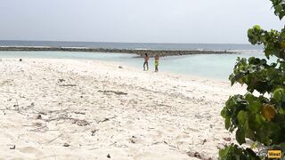 Pervert cummed on beauties during the time that they were sunbathing on a public beach